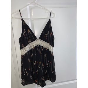 Black pattern romper with lace detail